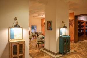 The wood-panelled 1950s Bar, with its herringbone floor, leather seating, framed prints and shelved spirits.