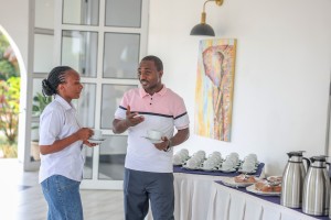 Delegates working and talking during a meeting at the hotel.