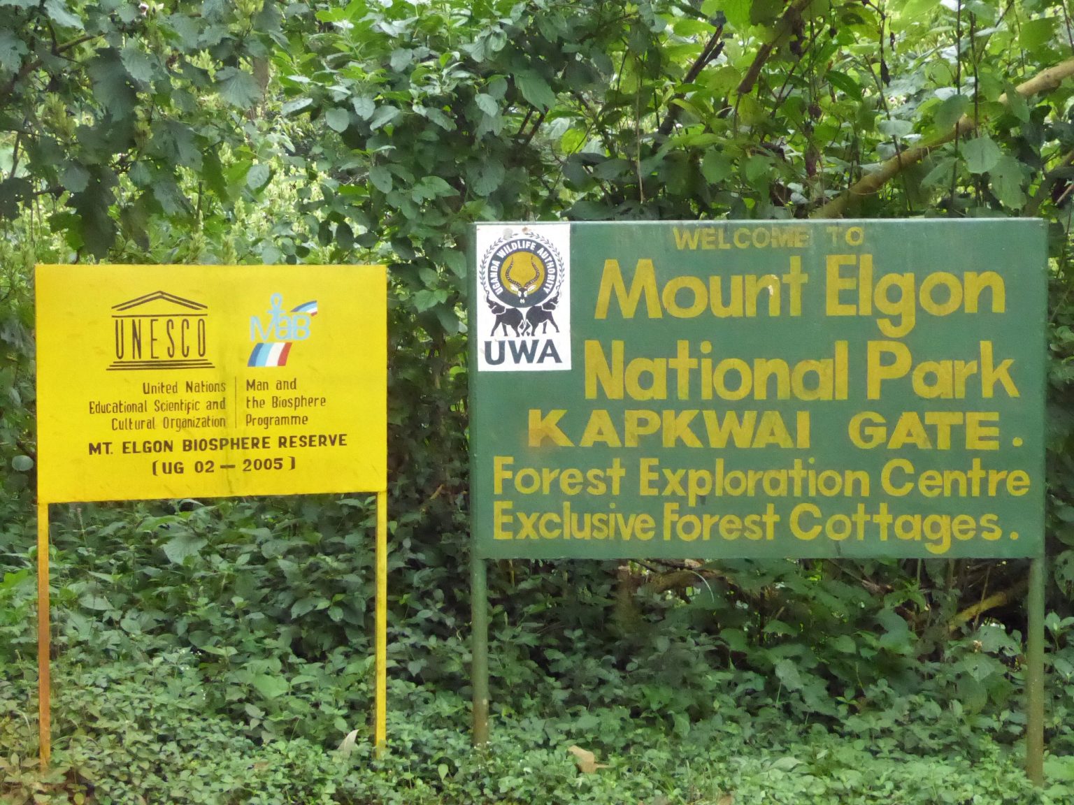 Signboards at Kapkwai Gate marking the entrance to Mount Elgon National Park and its biosphere reserve.
