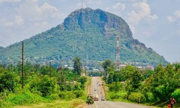 Tororo Rock rising above the road on the approach into Tororo town.